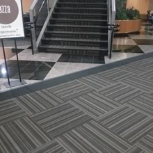 Carpet tile with border staircase